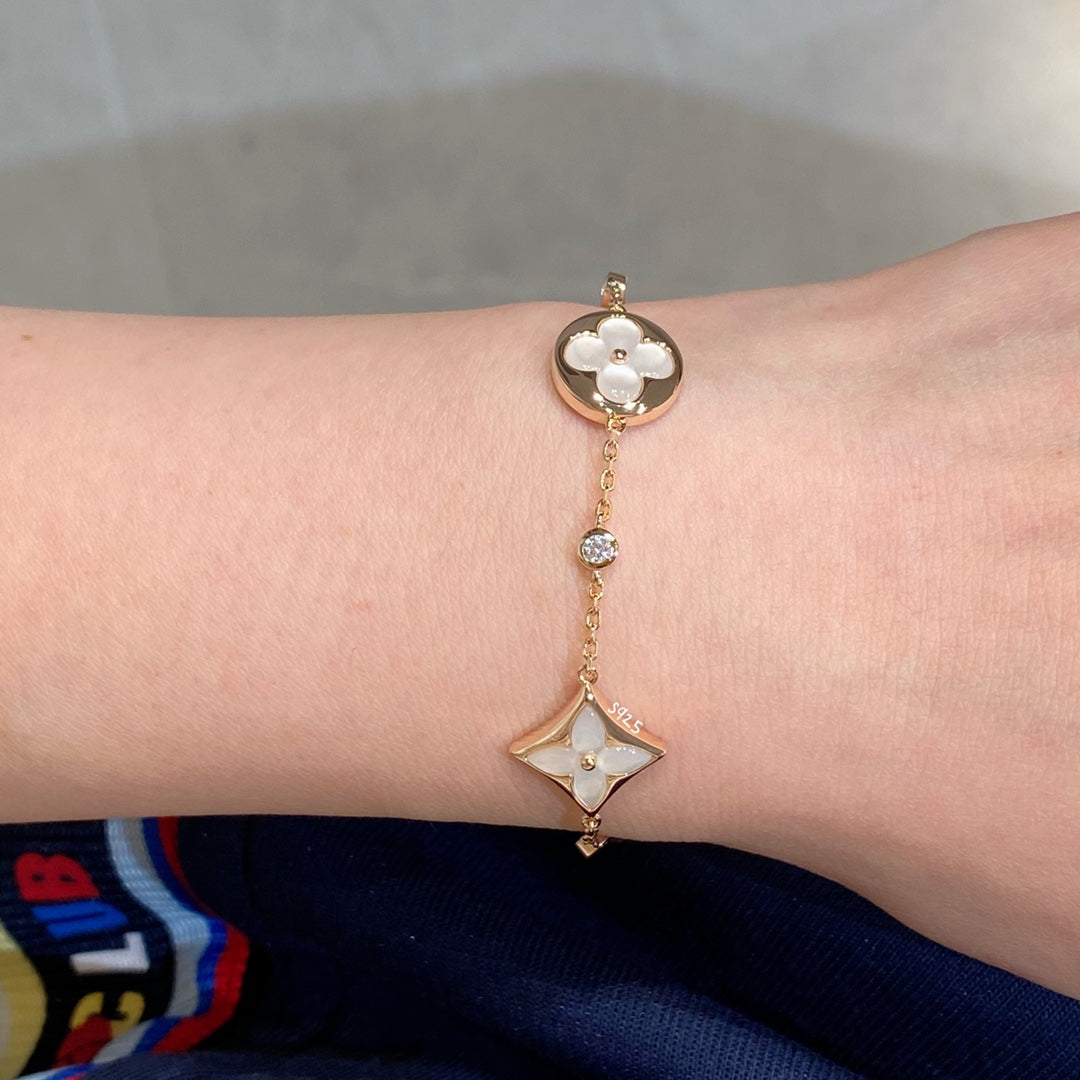 ¡®Moco¡¯STAR AND SUN 4 MOTIF WHITE MOP PINK GOLD BRACELET